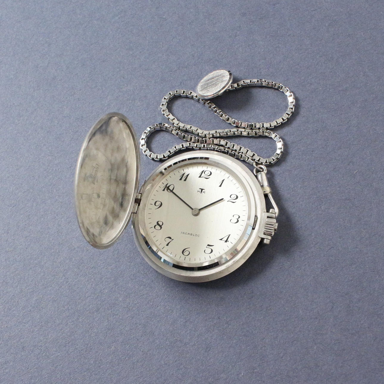 Reloj de bolsillo HTA con cadena, oro blanco 585.