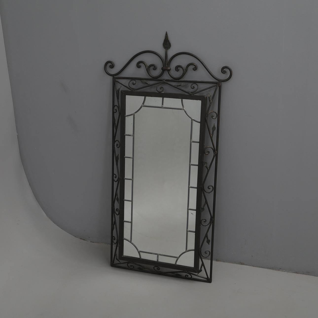 CAST IRON MIRROR.