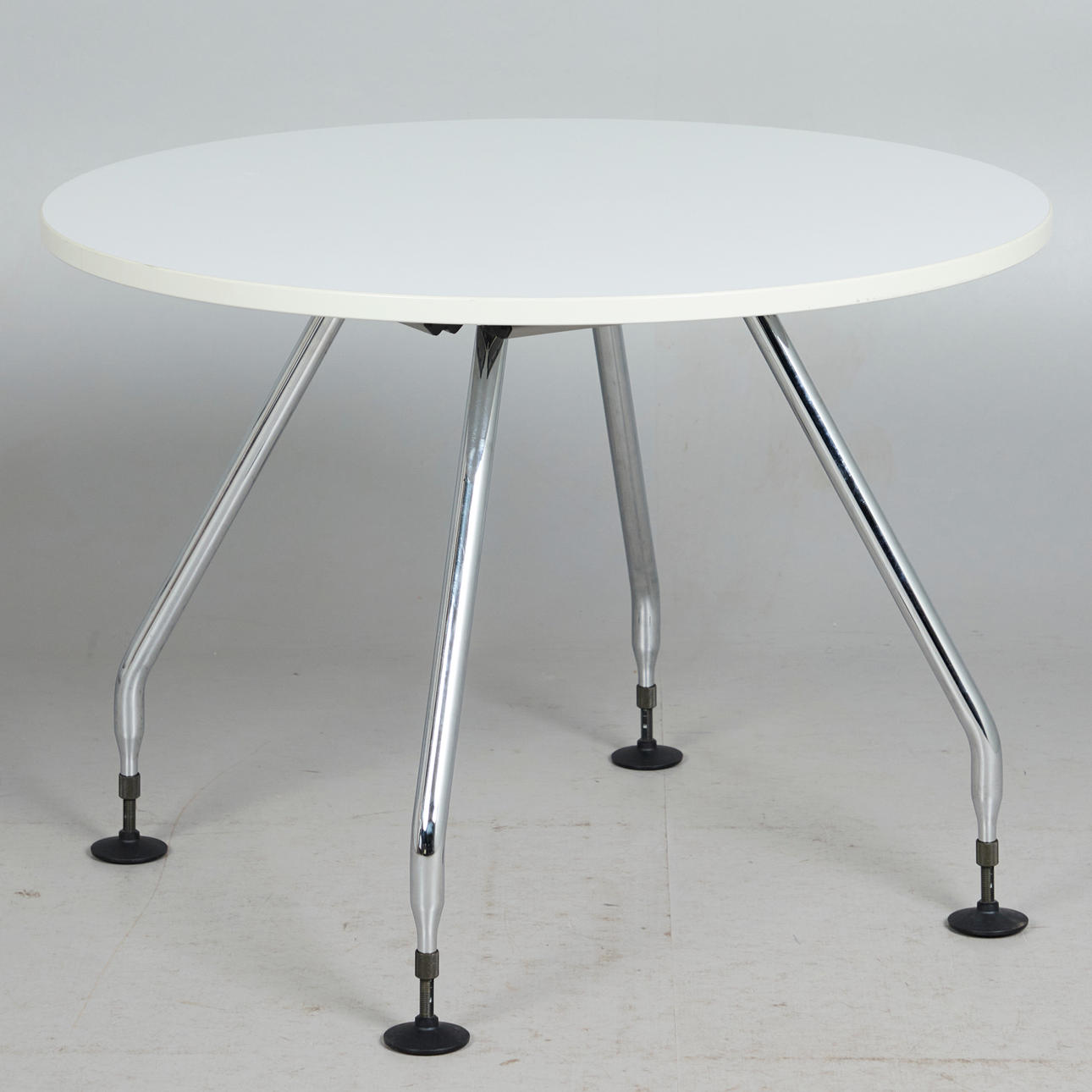 NORMAN FOSTER. Tecno, dining table/table, Nomos model, chrome-plated steel, plastic veneer, designed in 1986, Italy.