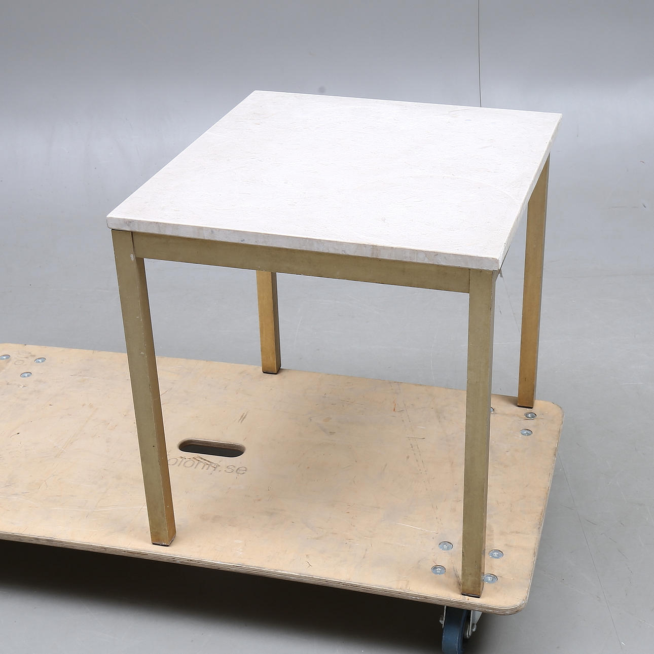 TABLE with stone top, metal frame, 1900s / 2000s.