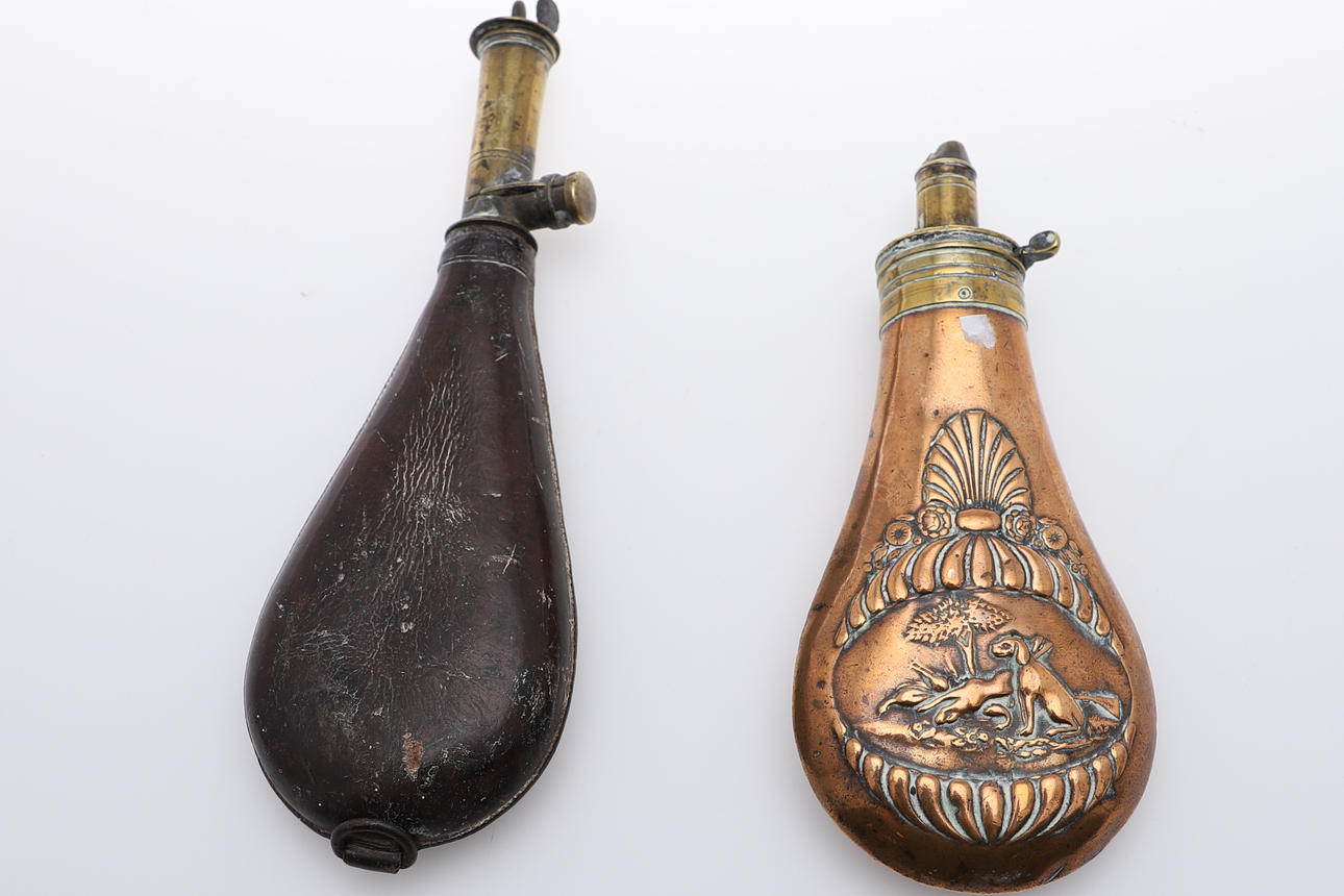 TWO 19TH CENTURY SHOT FLASKS.