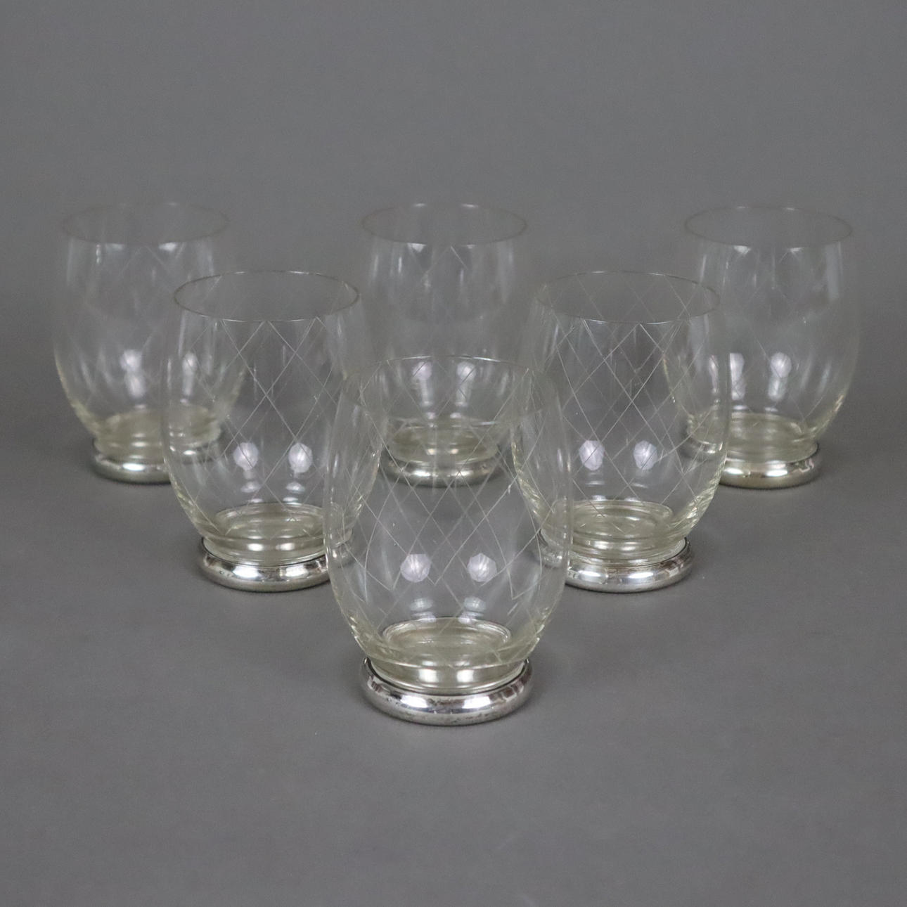 - 6 BEAKERS with silver mounts.