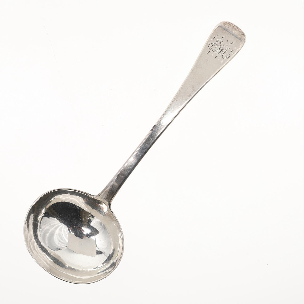 A VICTORIAN SILVER OLD ENGLISH PATTERN SAUCE LADLE.