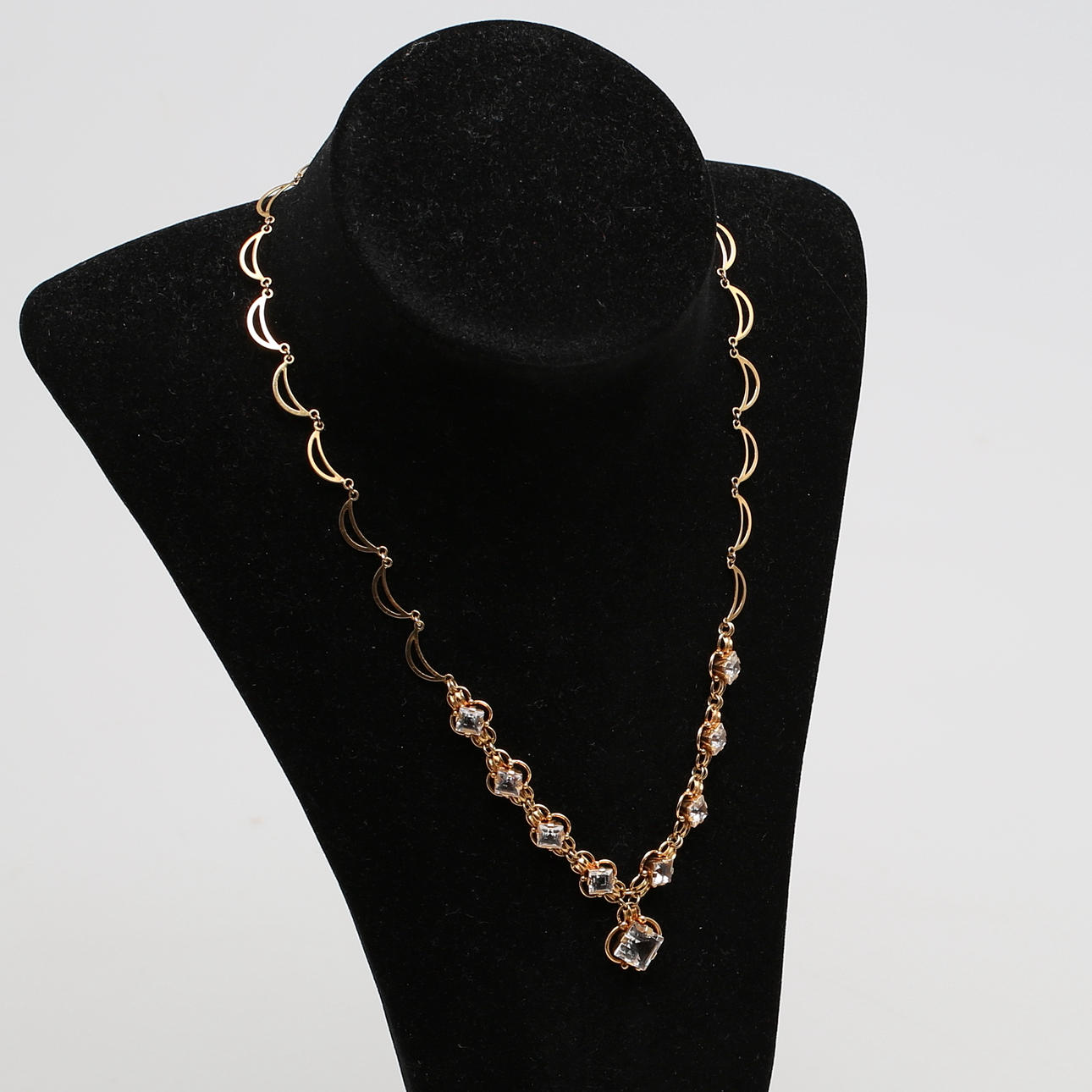 HALSBAND samt ARMBAND i 18 karat gulguld med bergskristall, Guldvaruhuset, 1950-tal, Stockholm.