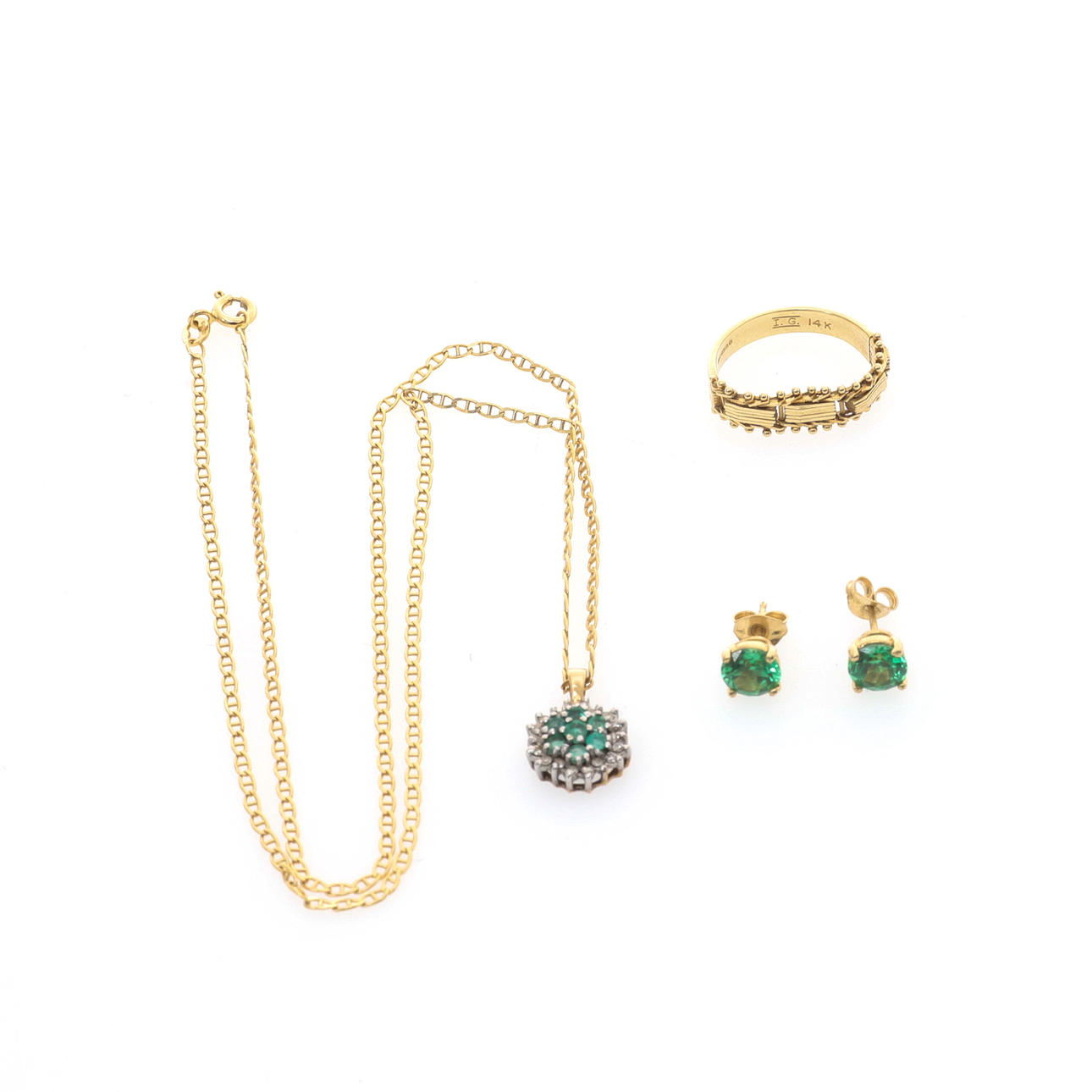 EN MODERN 14 KARAT GULD KLÄNNING RING.