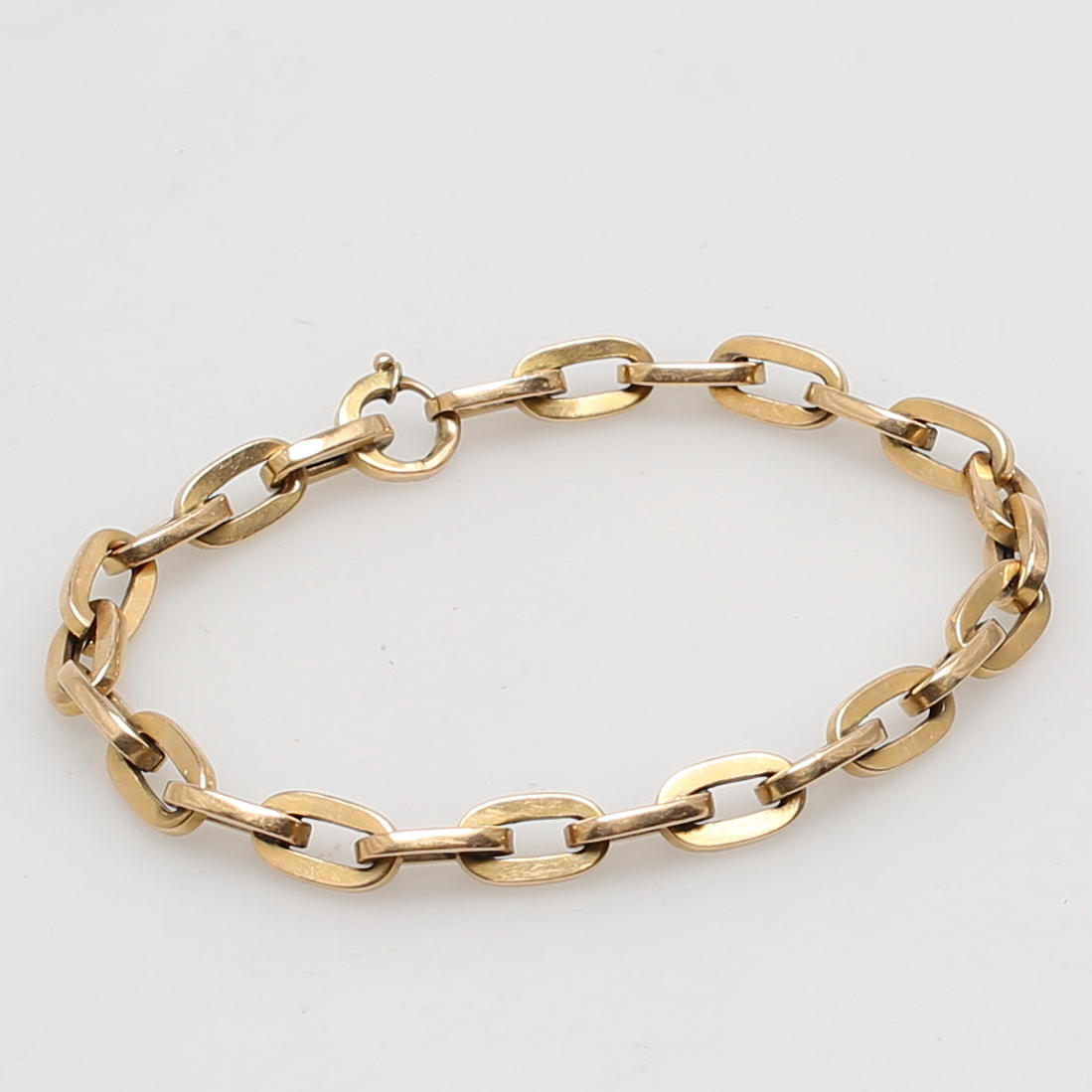 ARMLÄNK i 18 karat gulguld, vikt 14 gram.