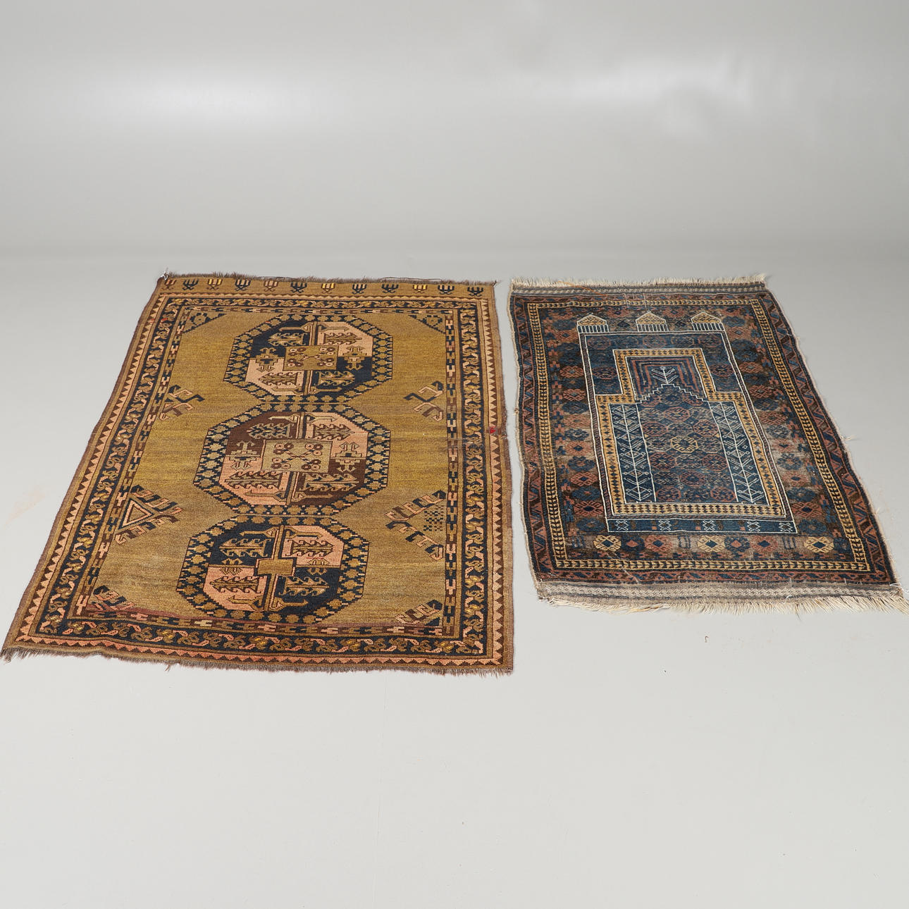 A BALUCH PRAYER RUG, 128cm x 87cm.
