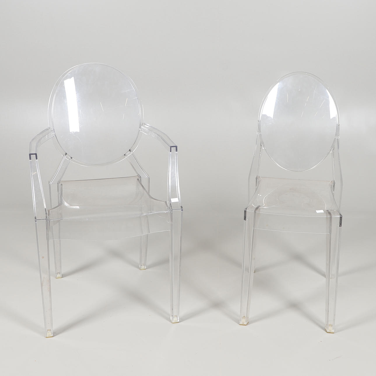 TWO PERSPEX CHAIRS.
