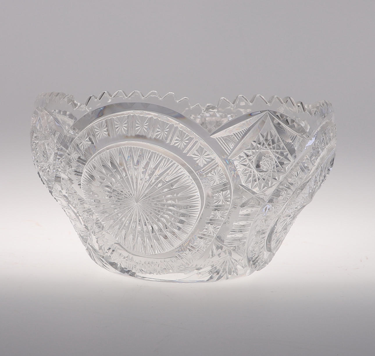 A LARGE IMPRESSIVE CUT CRYSTAL PUNCH BOWL.