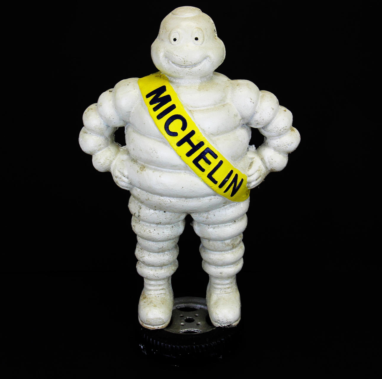 CAST IRON MICHELIN MAN FIGURE.