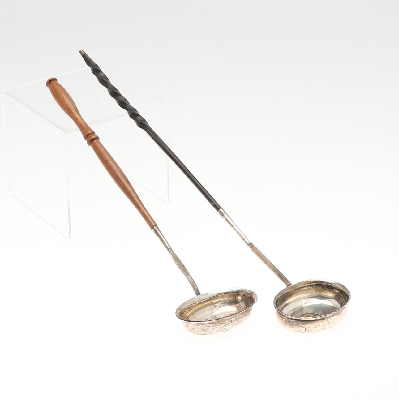 TWO SILVER COIN SET PUNCH LADLES.