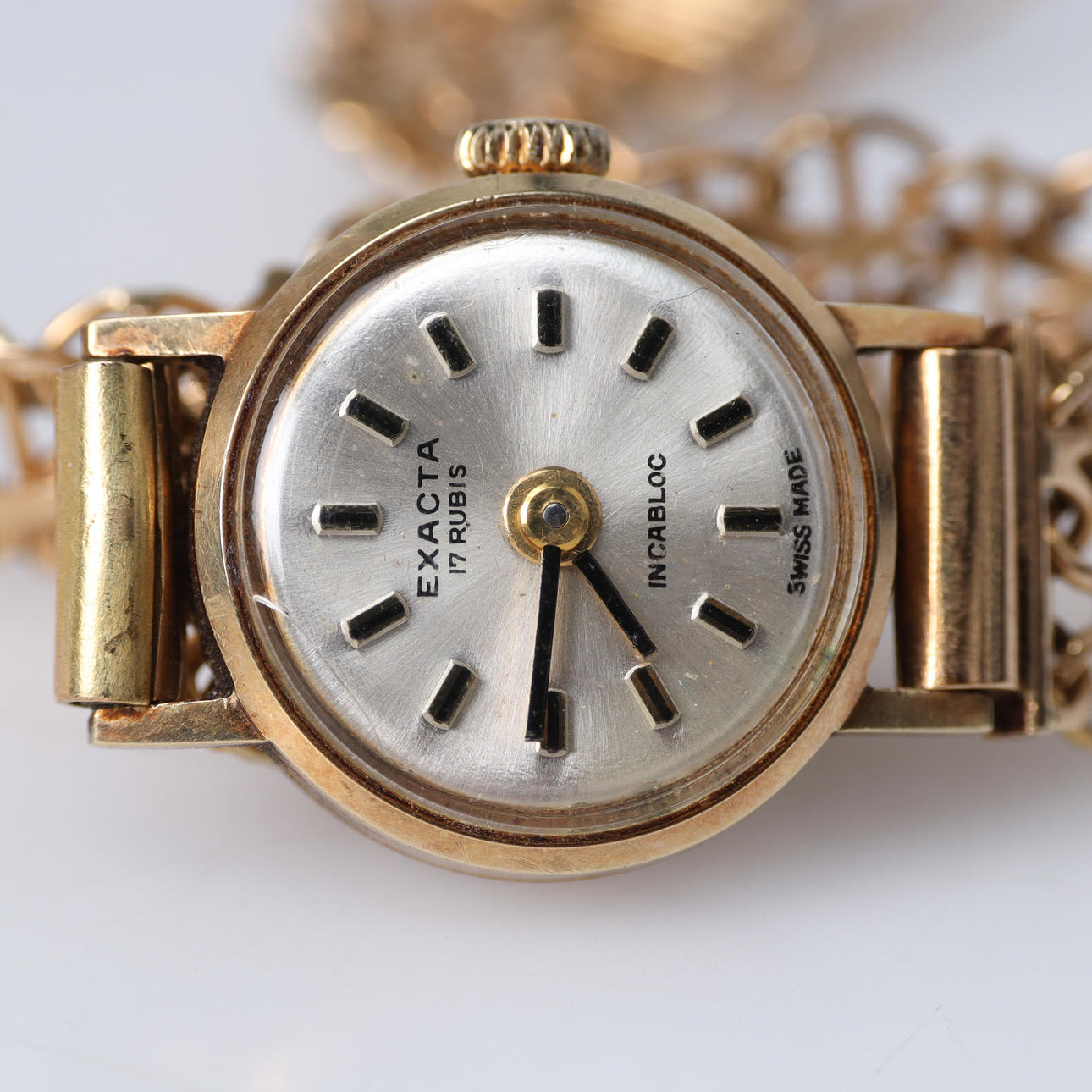 EXACTA, damur i 14K, länk i 18K guld.