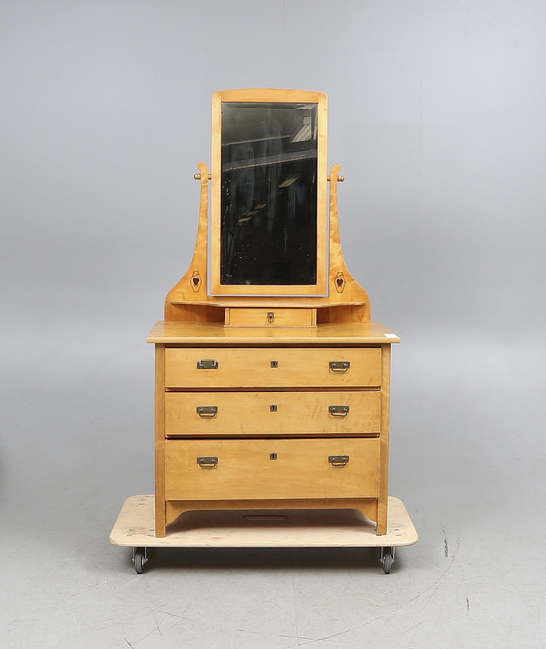 SPEGELBYRÅ, 1900-talets första hälft.