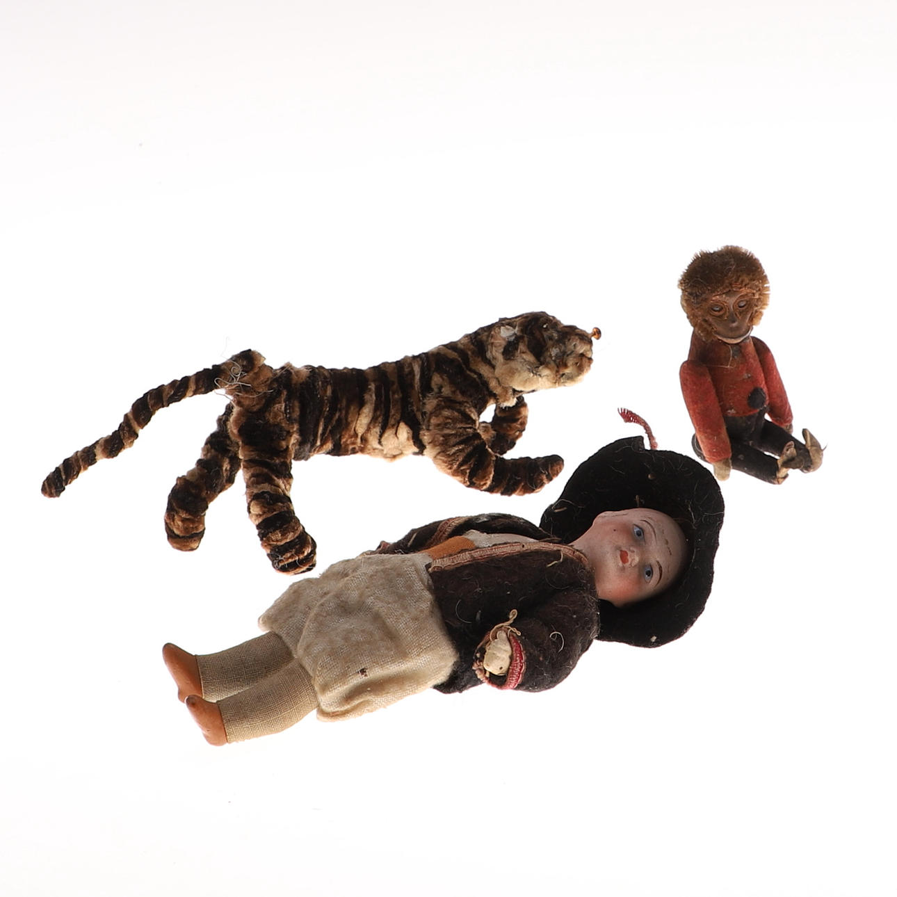 EN ANTIK SCHUCO MINIATURFIGUR AF EN ABE.