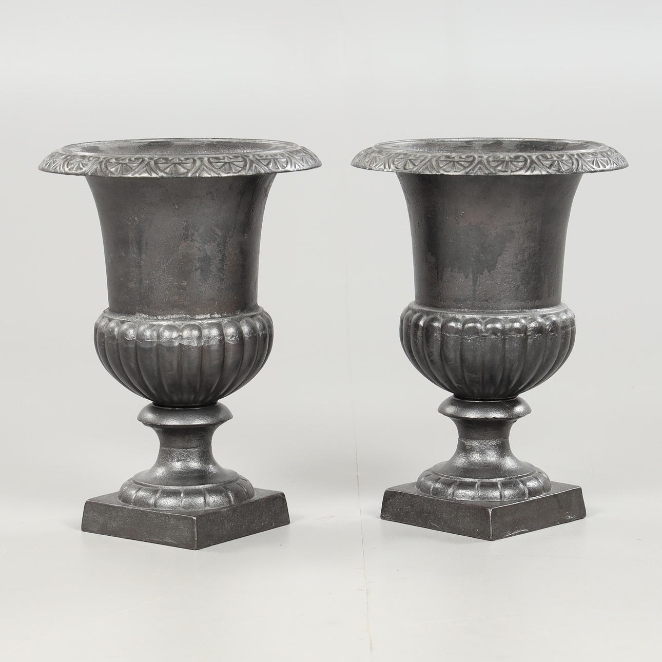 URNS, a pair, cast, contemporary.