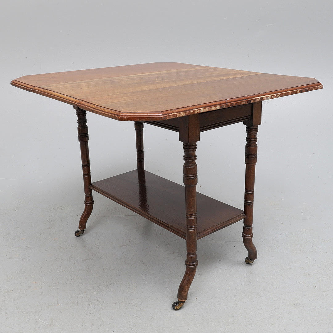 AN EDWARDIAN MAHOGANY TWO-TIER SUTHERLAND TABLE.
