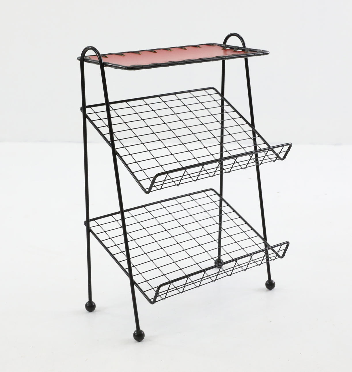 TIDNINGSSTÄLL, string, 1950/60-tal.