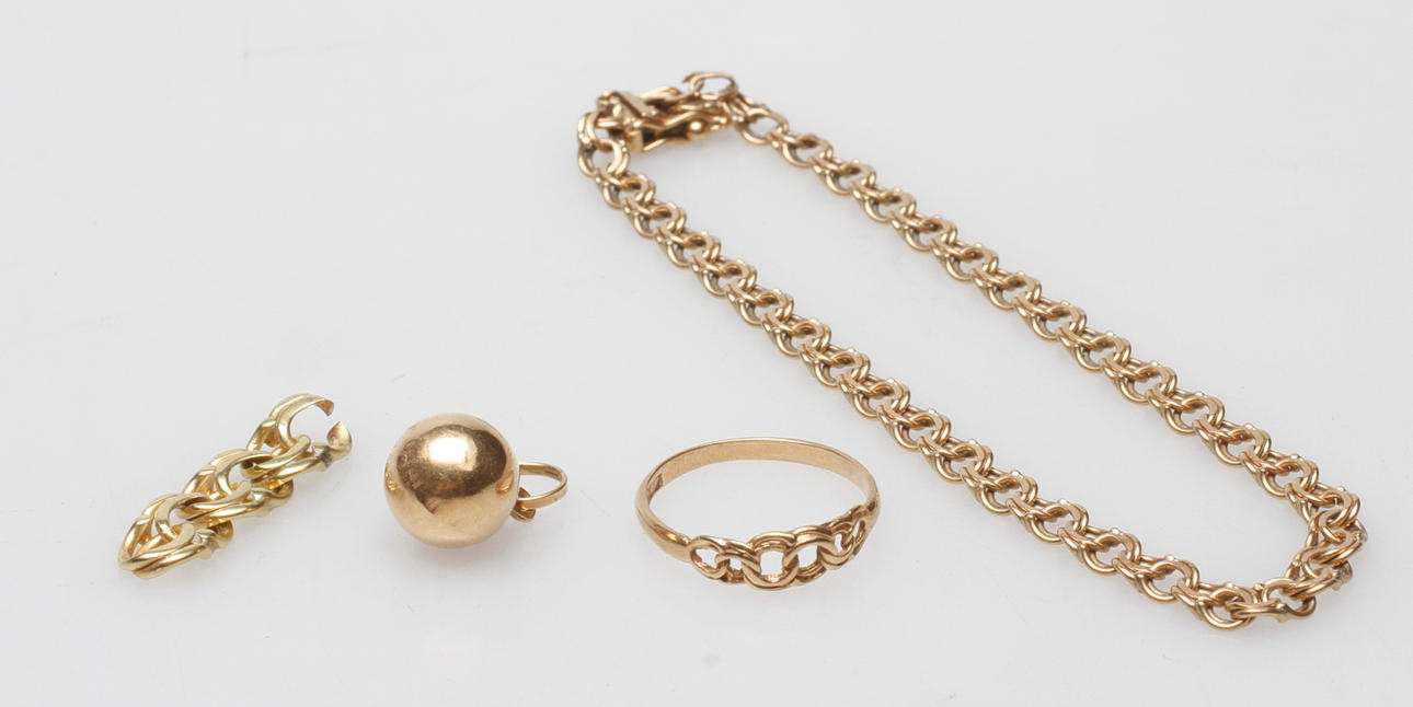 GULDSMYCKEN, 18k guld, vikt ca 11,6 gr.