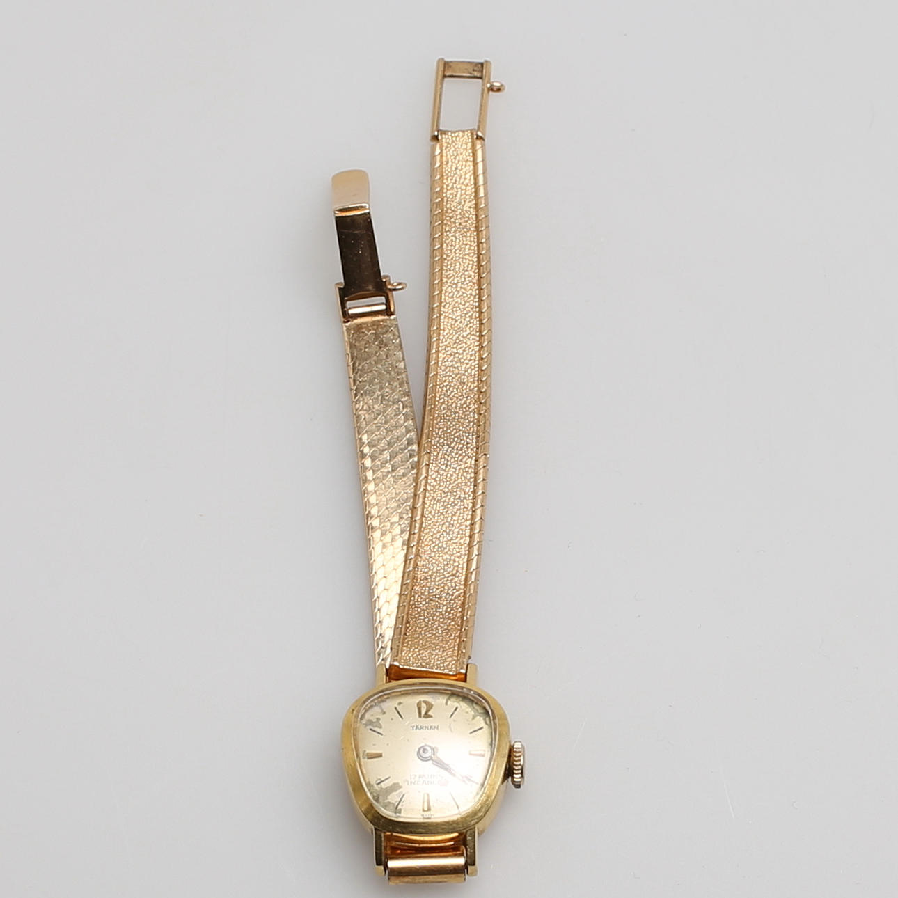 DAMARMBANDSUR, Tärna, 18 karat gulguld.