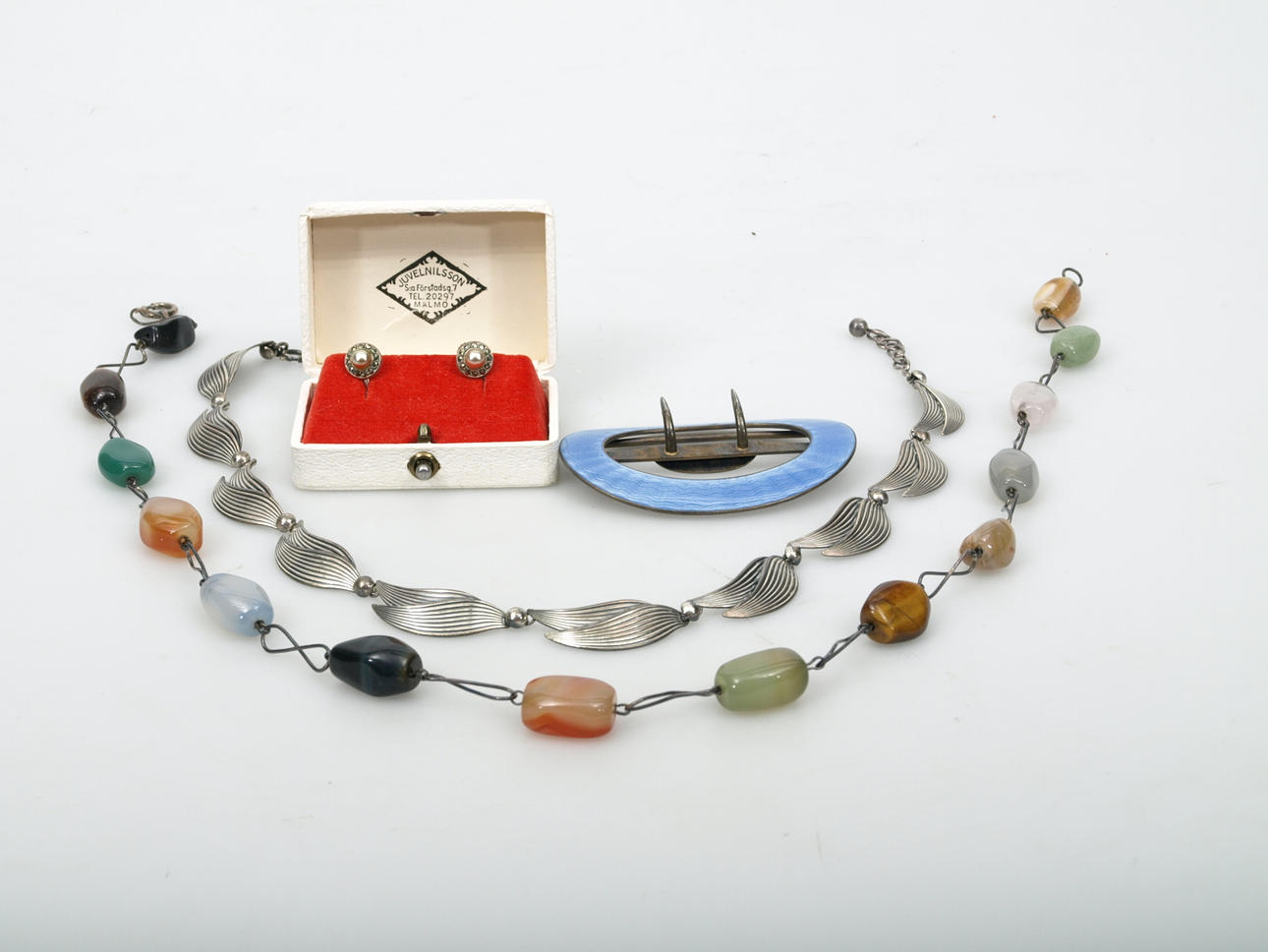 SMYCKEN, silver, emalj och stenar.