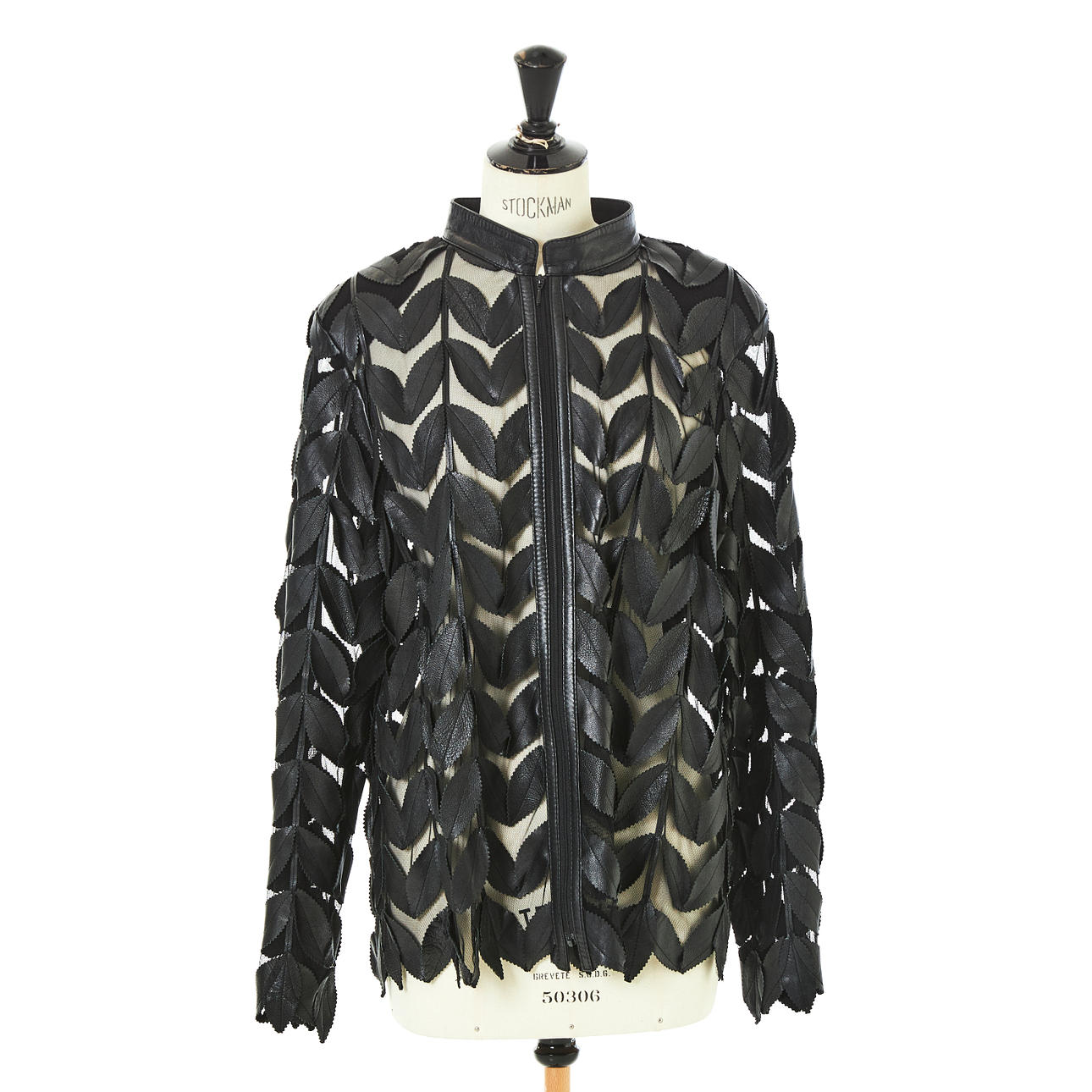 ELEGANCE, black jacket with leather details, pattern representing leaves.