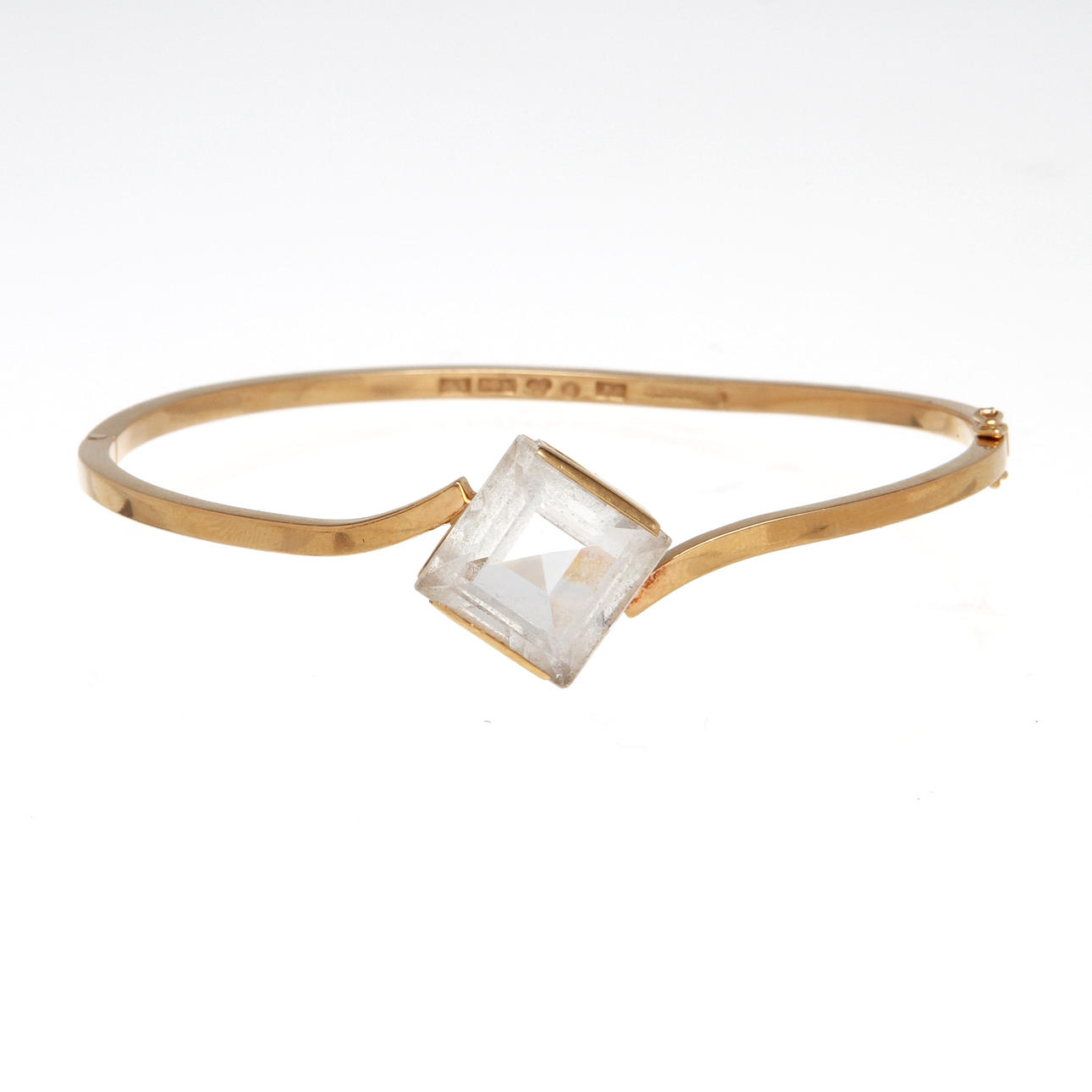 ARMRING, 18K rödguld samt bergskristaller, Stigbert, Vikt 11,0 g.