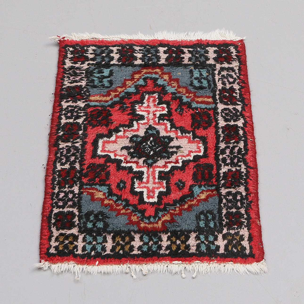 MINITEPPICH, 1900er, 55 x 38 cm.