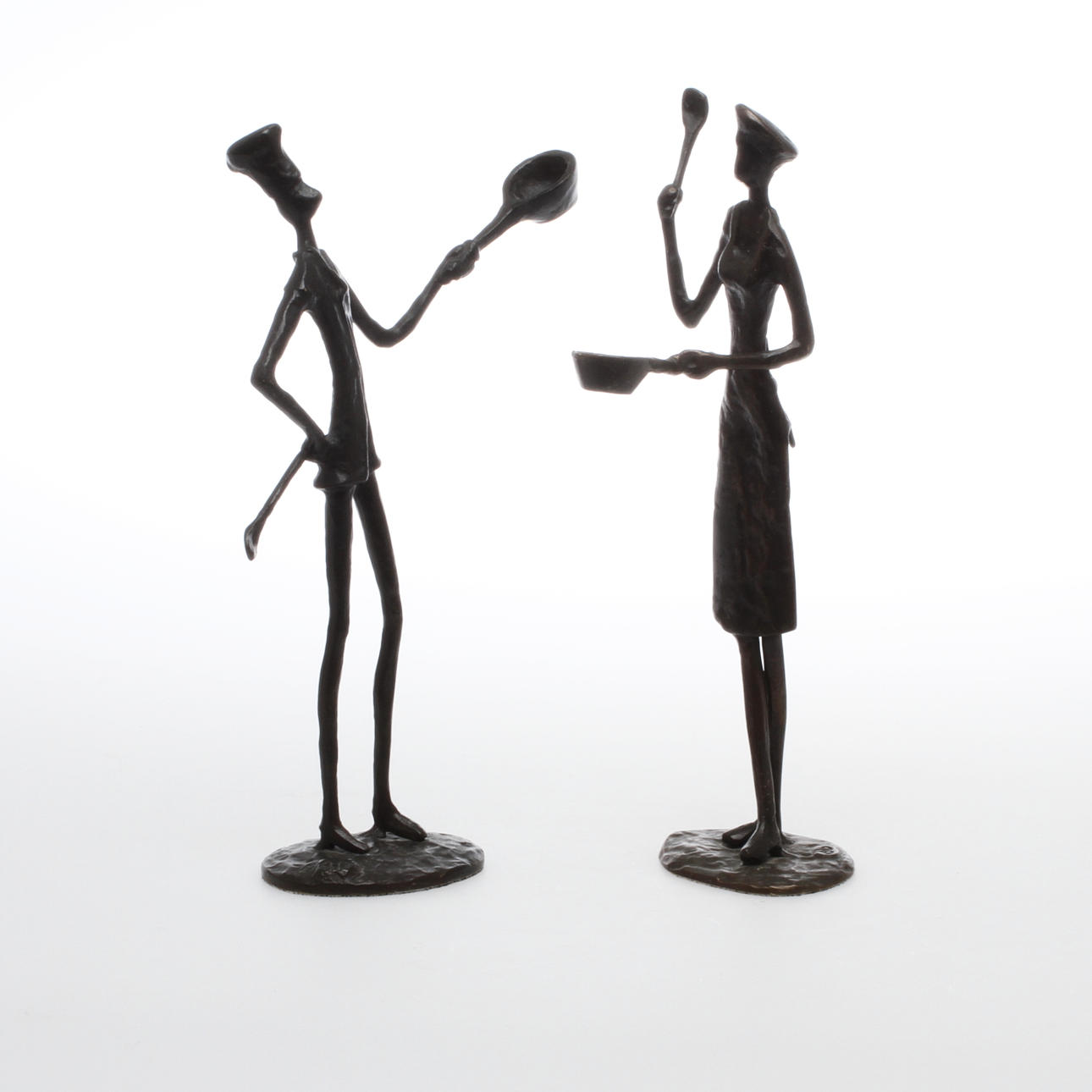 OKÄND KONSTNÄR. Skulpturer, 2 st, Kock och kokerska, brons, 1900-tal.