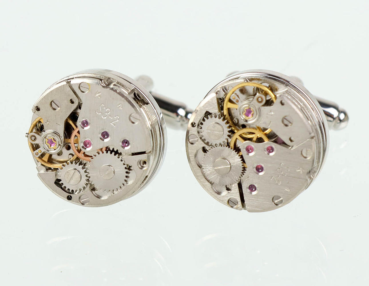 MANSCHETTENKNÖPFE, Uhrwerk Form.