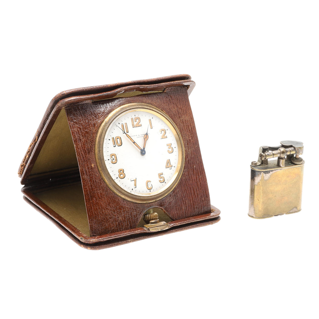 A BRASS DUNHILL LIGHTER AND A MAPPIN & WEBB FOLDING TRAVEL CLOCK.