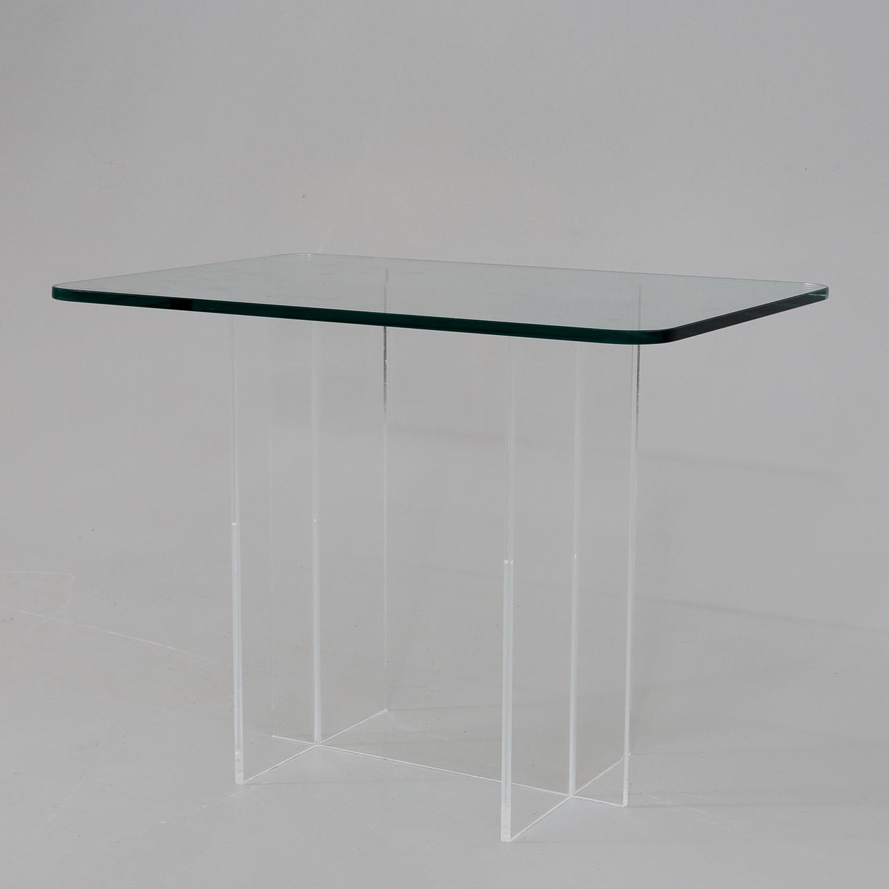 SIDE TABLE, plexiglass & glass, 1980s.