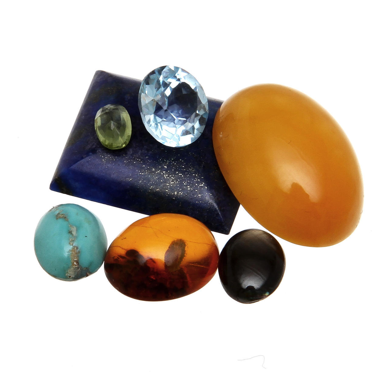 ÄDELSTENAR, 7 st, Lapis, bärnsten 2 st, turkos, peridot, topas samt safir.