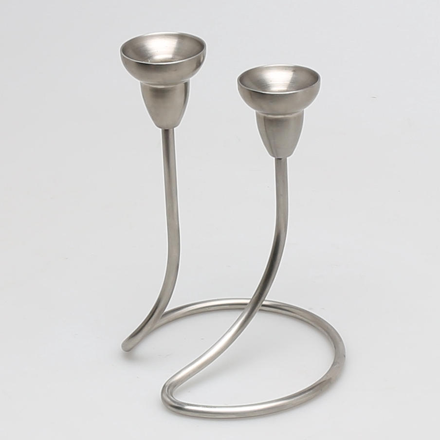 KANDELABER i rostfritt stål, "Swing", Jens Jensen för Georg Jensen, Danmark.