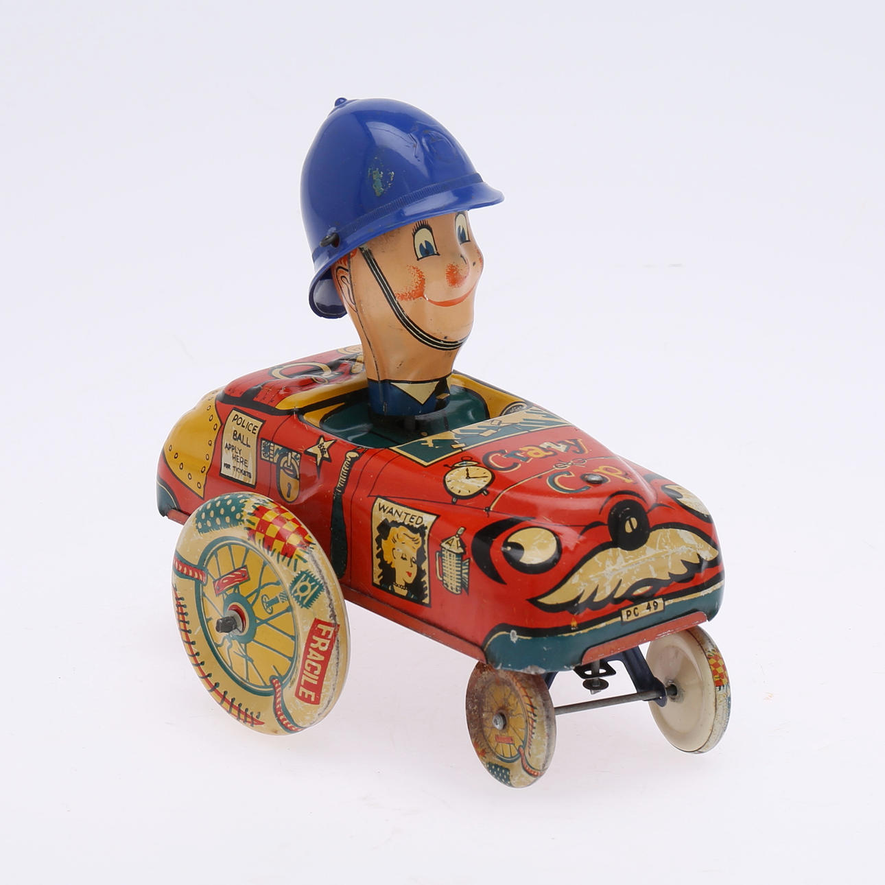 TIN TOY, "Crazy Cop", lithographed tin, England.