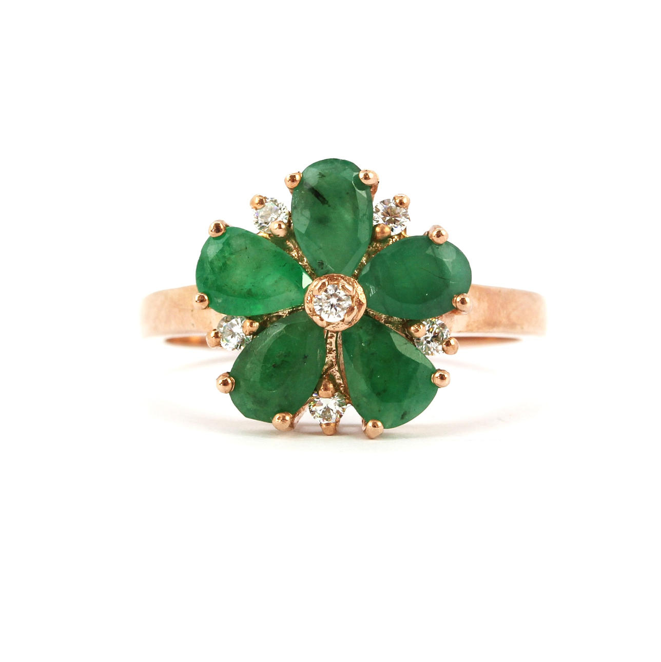 FLOWER SHAPED EMERALD AND WHITE STONE SILVER RING.