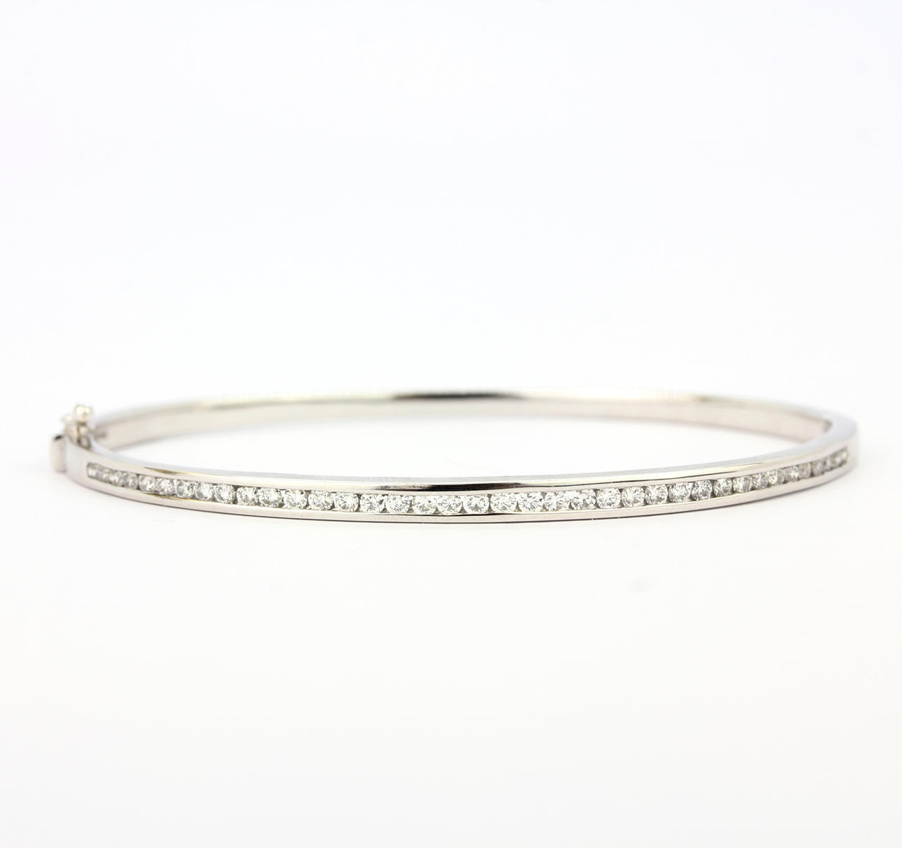 PLATINA ARMBAND SET MED DIAMANTER.