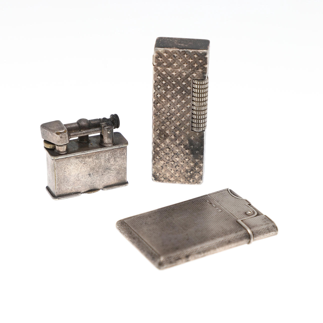 TWO STERLING SILVER CIGARETTE LIGHTERS.