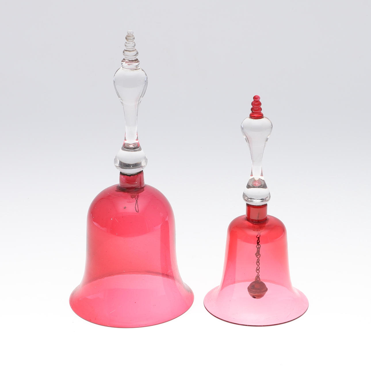 TWO VICTORIAN CRANBERRY GLASS BELLS.