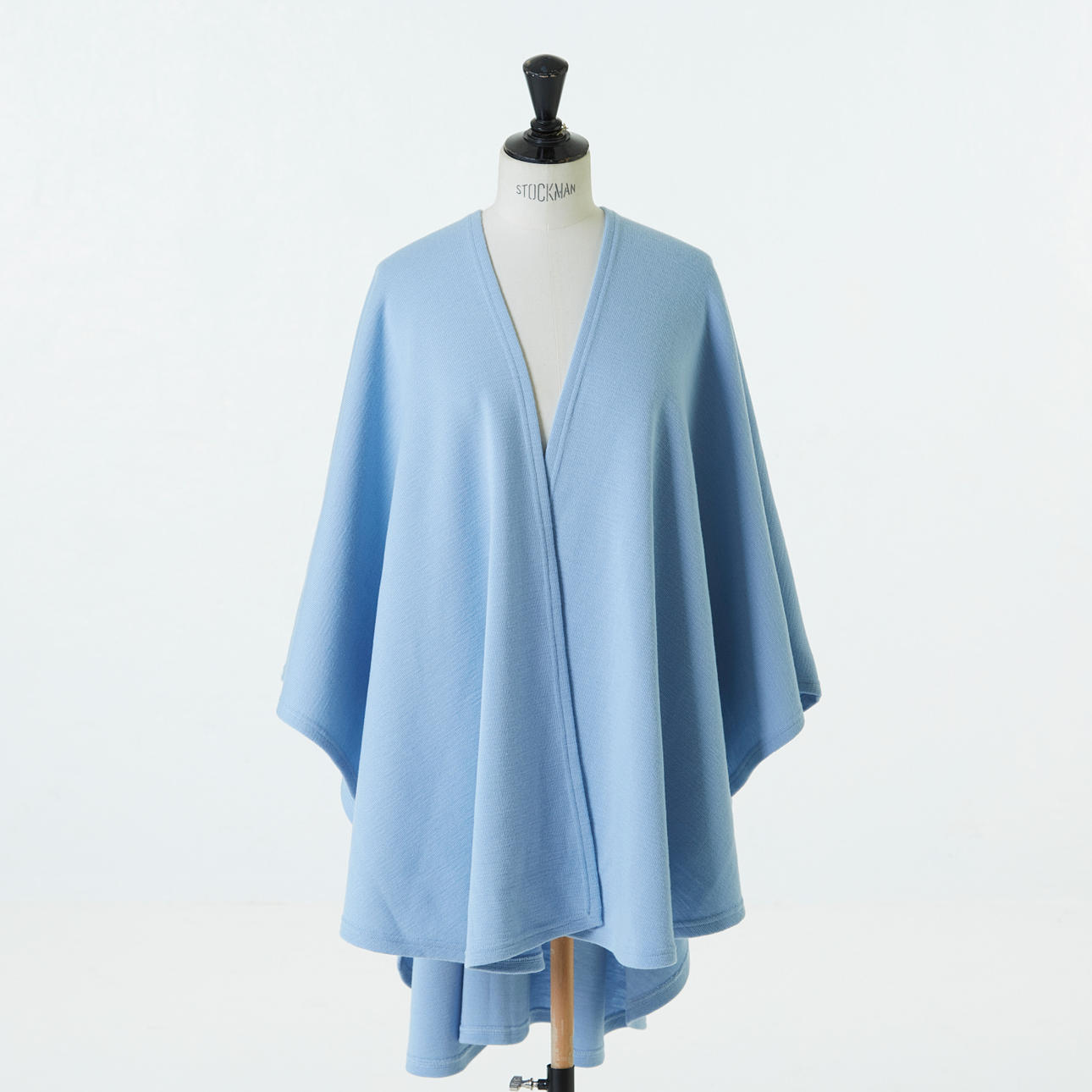 BUSNEL, cape, light blue lambswool, labeled.