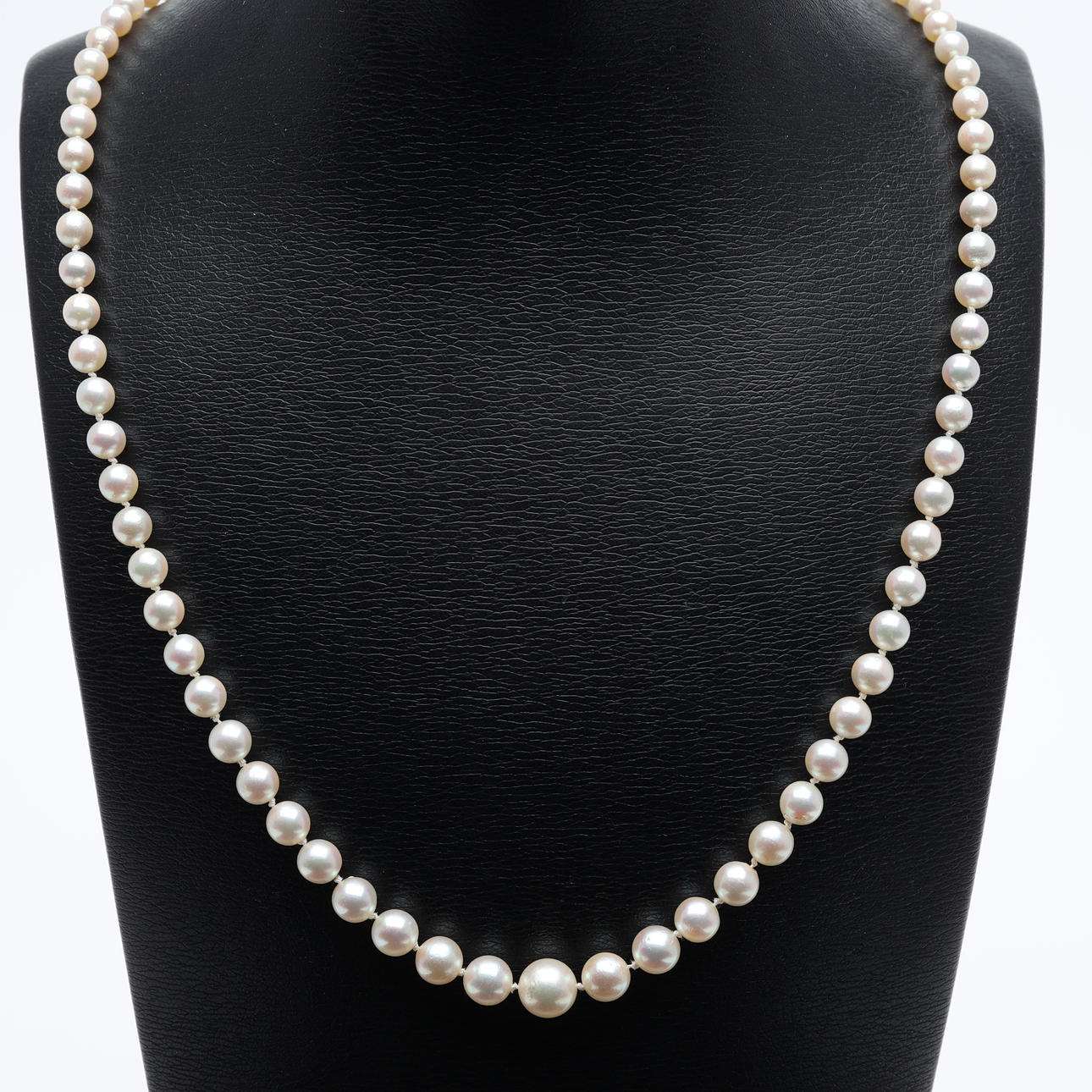 PÄRLCOLLIER doserat med lås i guld 18K.