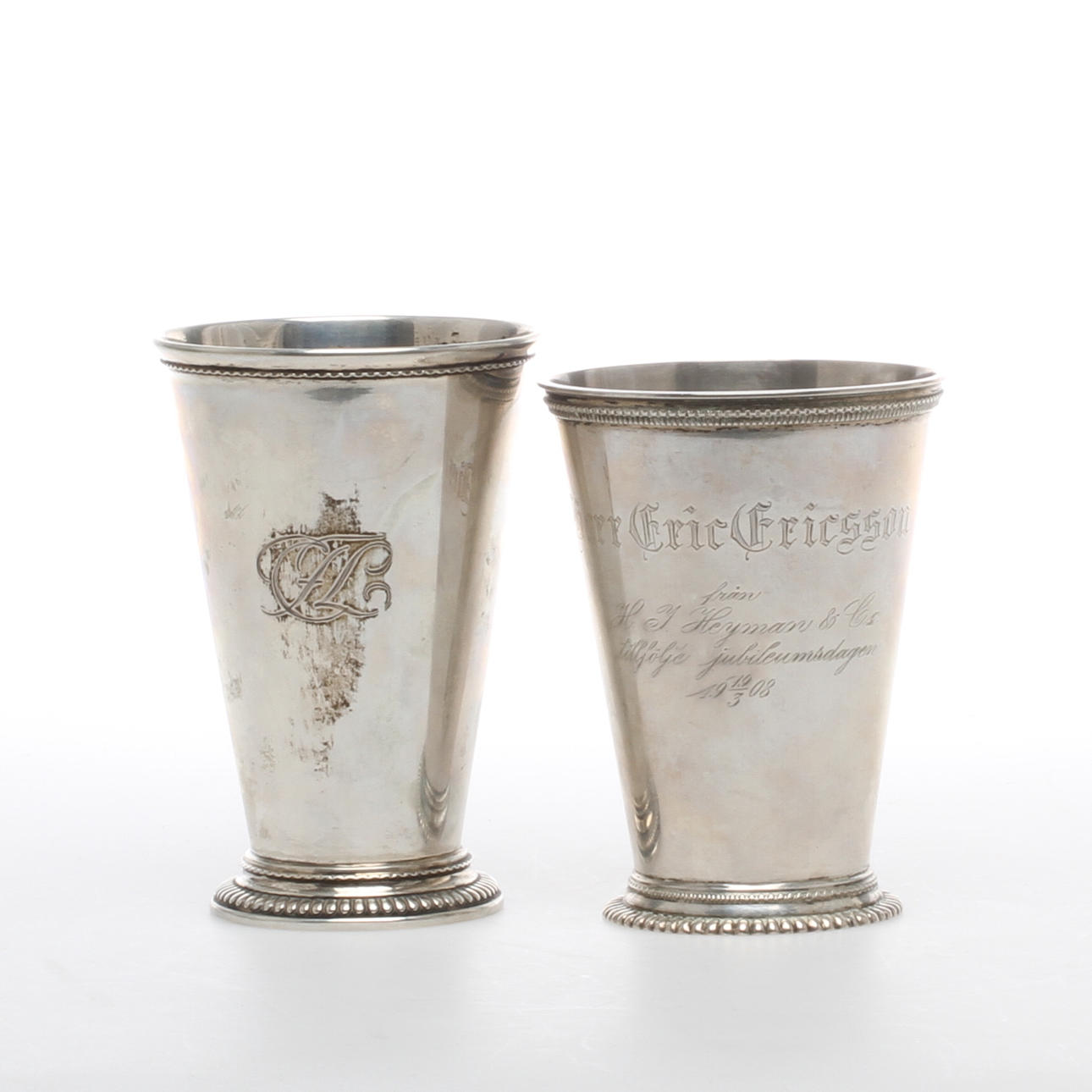 BÄGARE, 2 st, silver, CG Hallberg och D.A.&Co, Stockholm, 1922 resp 1905.