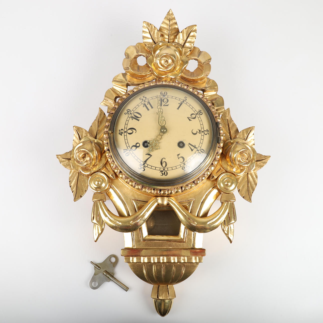 WALL PENDULUM, gilded, mid-20th century.