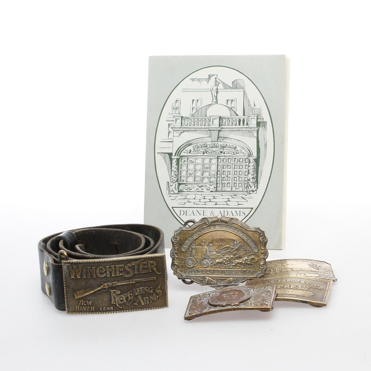 BÄLTESSPÄNNEN, 5 st, samt KATALOG, 1900-tal.