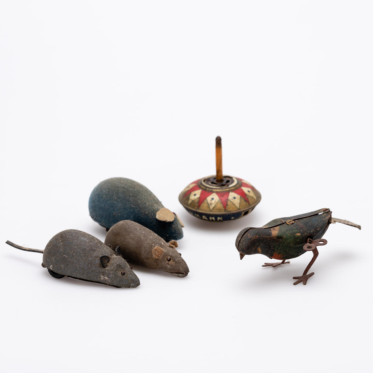 SCHUCO / LEHMANN. Aufziehtiere (4) und ein Kreisel.