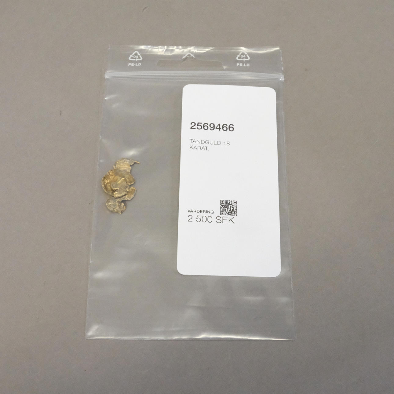 TANDGULD 18 KARAT.