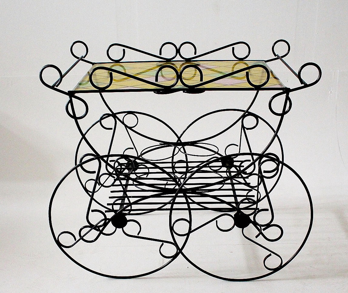 TEVAGN, glasskiva och metall.