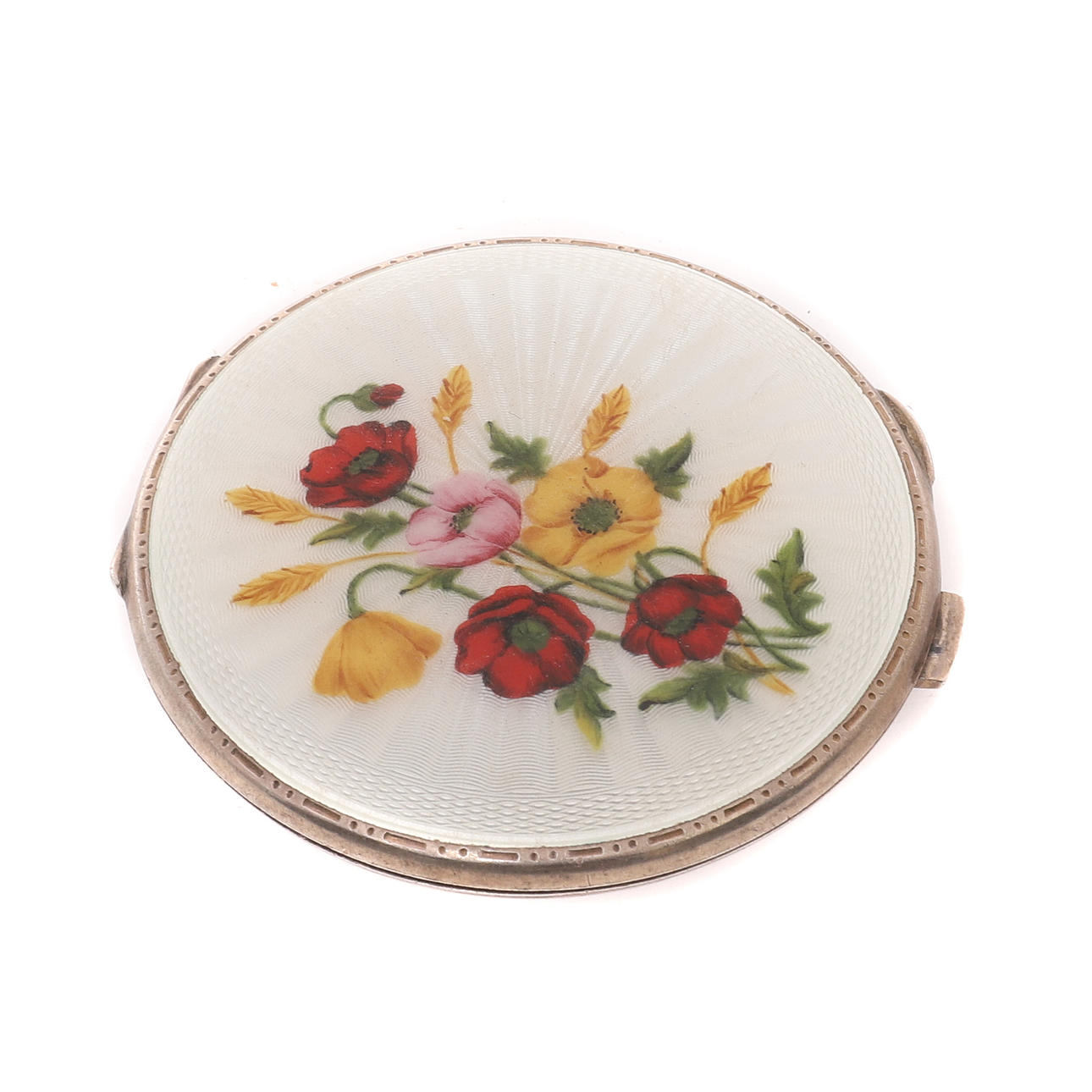 A SILVER AND GUILLOCHE ENAMEL ENGINE TURNED CIRCULAR COMPACT.