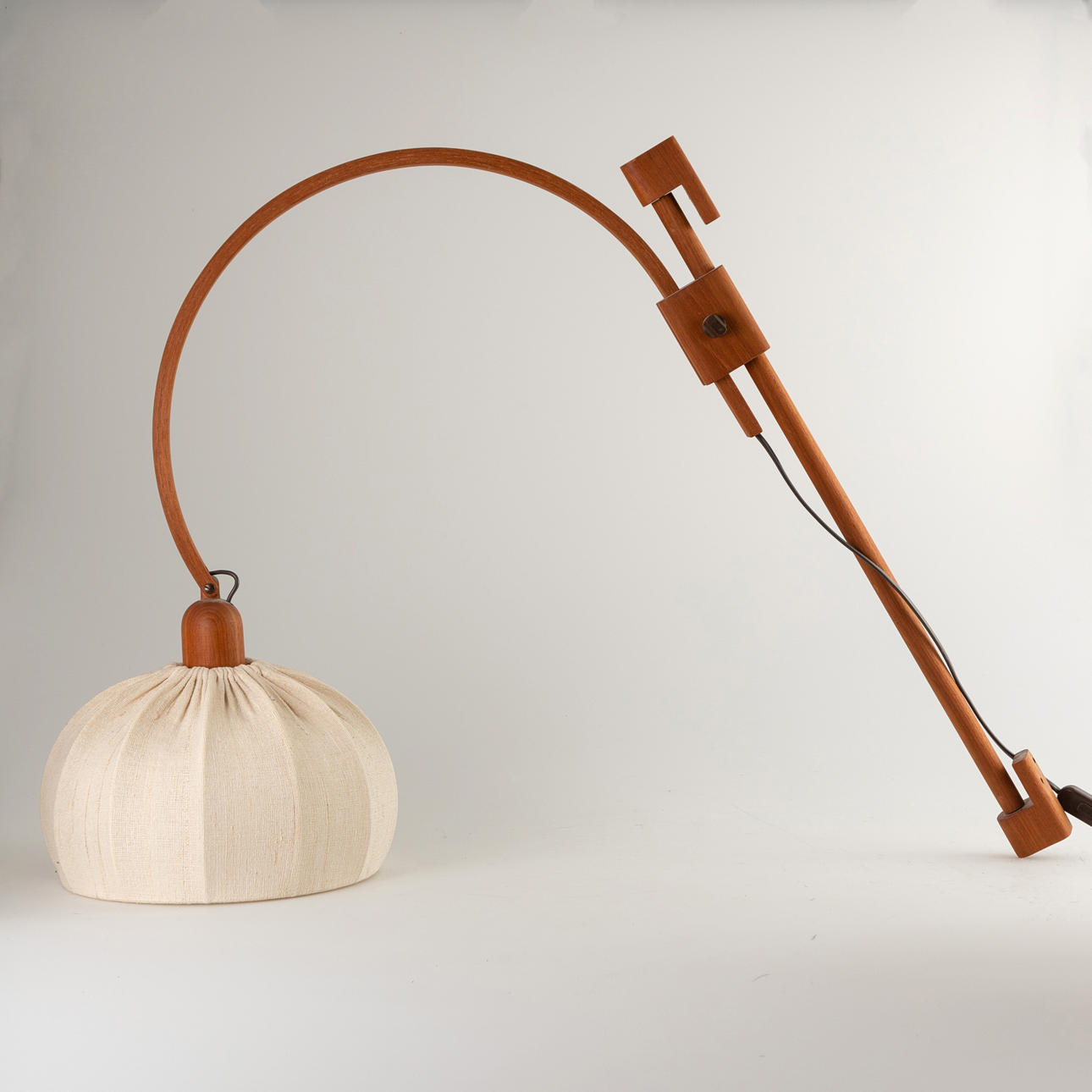 Teak wall lamp. Mid-century design.