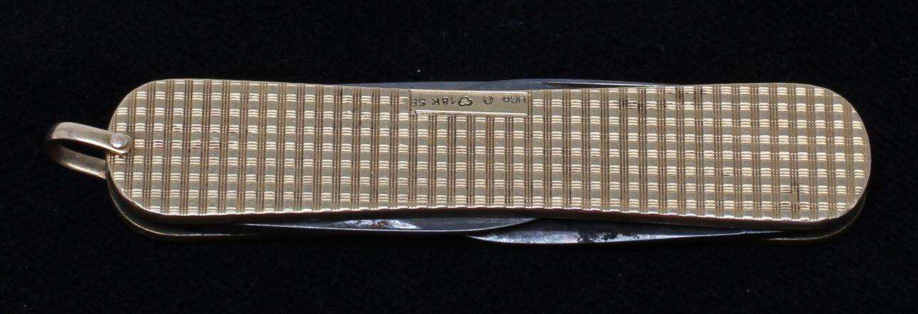 FICKKNIV, delvis 18 k guld, 1944, vikt ca 50 g.