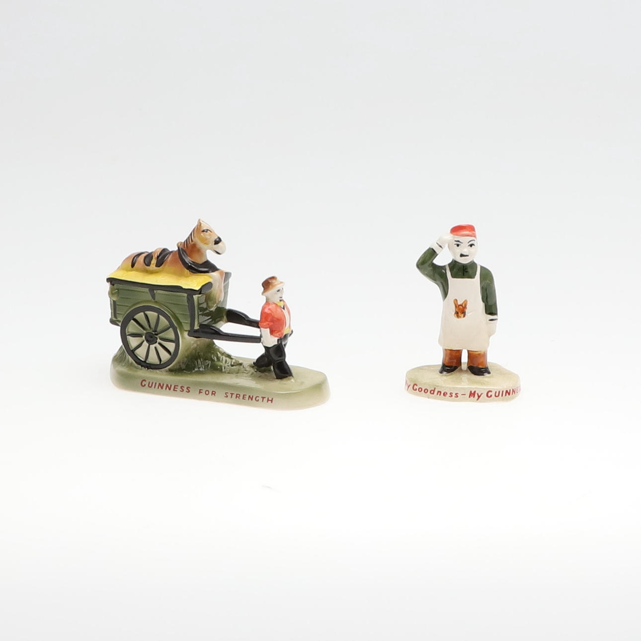 ZWEI CARLTONWARE GUINNESS WERBEFIGUREN.